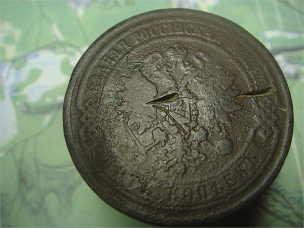 5 копеек 1869 года - кто то похоже в нее ножи метал :(