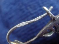 Серебрянная серга с камнем 