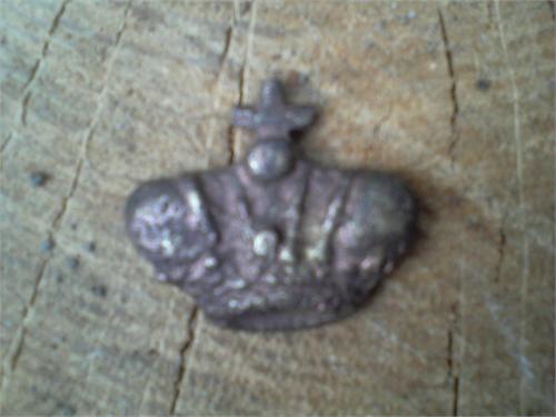 Мне кажется что это наконечник от короны