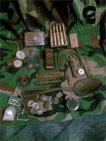 Мелочевка собрана во время копа на местах боев. 