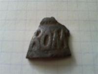 похоже на осколок от колокола(буквы 