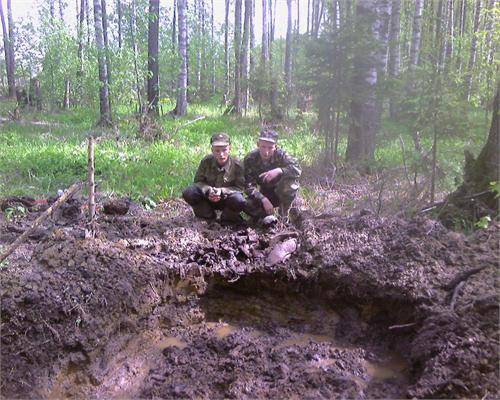 а вот эта траншея из которой изымали погибших(12человек)