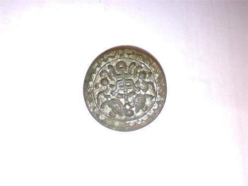 или пуговица или знак, что это?