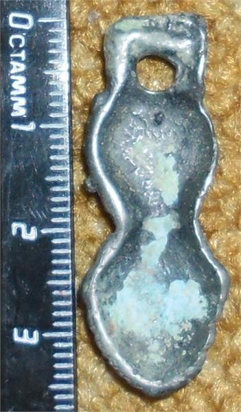Подвеска. Металл похож на цинк. Дальний Восток XIII-IX век