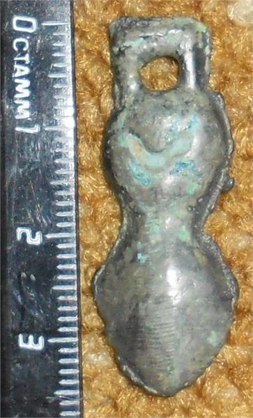 Подвеска. Металл похож на цинк. Дальний Восток XIII-IX век