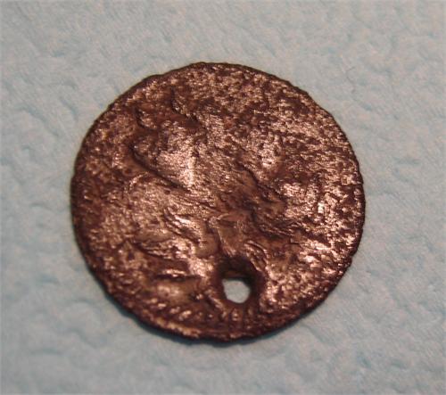 Диам.20мм.Серебро. Сверху два сердца пробитых стрелой, а внизу две птицы (голубя )