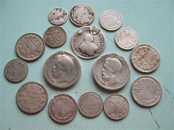 Билон и серебро, большие былии с дырками, но кто то их заделал